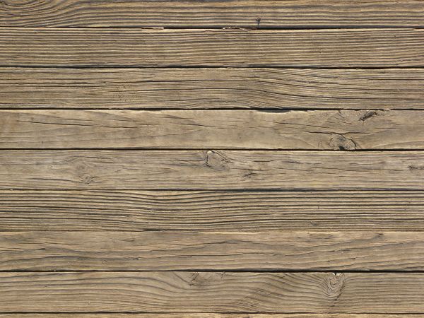 Old brown planks set evenly and horizontally.